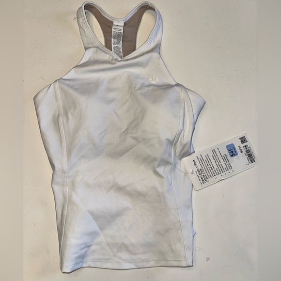 lululemon athletica Tops - Lululemon Athletica waist length vneck tennis White Tank Top Size 2